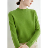 Bright red women's cashmere crew neck sweater, winter fashion pullover, displayed on a model showcasing the shoulder, neck, and sleeve details.