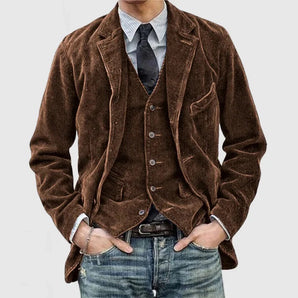 Brown corduroy slim fit retro men's blazer in size 3XL, featuring a classic design with long sleeves and a structured collar, suitable for formal or casual occasions.