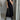 Brown elegant cap sleeve pleated maxi dress, featuring a flowing design perfect for summer, modeled in the Nero color in size 3XL, highlighting the dress's cap sleeves and pleated waist.