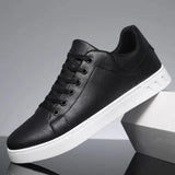 Brown leather men's low-top sneakers with a stylish and versatile design featuring a contrasting white sole, shown in a black color variant, size 47.