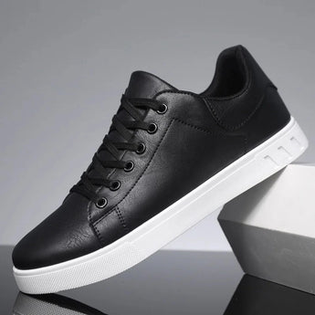 Brown leather men's low-top sneakers with a stylish and versatile design featuring a contrasting white sole, shown in a black color variant, size 47.