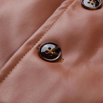 Brown leather vest for men displayed on a mannequin over a beige dress shirt, showcasing a tailored fit and stylish design with a collar and buttoned front.