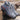 Gray waterproof hiking shoes with ankle support, designed for outdoor activities, featuring a suede appearance and a lightweight build.