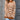 Brown and white zigzag patterned crew neck women's sweater displayed on a mannequin, showcasing its autumn fashion knit design.