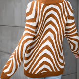 Brown and white zigzag patterned crew neck women's sweater with long sleeves, designed for autumn fashion.