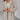 Brown women's oversized teddy coat in beige, featuring long sleeves, a wide collar, and a cozy design suitable for warm winter fashion, shown in size 2XL.