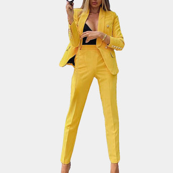 Brown women's suit featuring a deep v-neck blazer and fitted trousers, shown in yellow color and XL size, with focus on outerwear design elements like sleeves, waist, and collar.