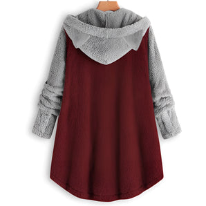 
Plus size women's winter pullover in burgundy fleece featuring long sleeves and a hood.