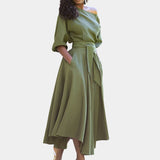 Burgundy midi wrap dress with an asymmetrical neckline and batwing sleeves, showcasing a stylish and elegant design suitable for day wear. The dress is displayed in a 3XL size, highlighting its fashionable cut and comfortable fit.