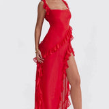 Burgundy off-shoulder ruffle maxi dress made from elegant chiffon, featuring a flowing design with ruffle detailing at the waist and a full-length skirt.