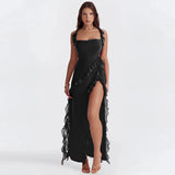 Burgundy off-shoulder ruffle maxi dress made of elegant chiffon, featuring a flowing design with a fitted waist and thigh-length draping. Suitable for formal occasions and offering a graceful, sophisticated look.