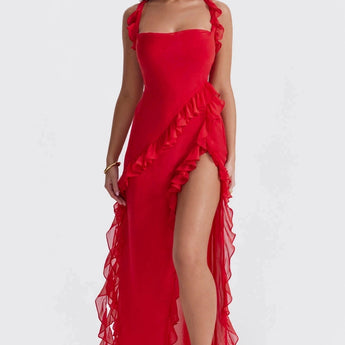 Burgundy off-shoulder ruffle maxi dress made of elegant chiffon, showcasing a strapless design with a fitted waist and flowing skirt, highlighting the neck and legs.