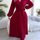 Burgundy pleated midi wrap dress with an elegant V-neck and tie waist, featuring long sleeves and a flowing skirt, displayed in a vibrant red color, size XL.