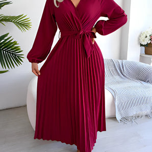 Burgundy pleated midi wrap dress with an elegant V-neck and tie waist, featuring long sleeves and a flowing skirt, displayed in a vibrant red color, size XL.