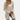 Burgundy ribbed women's long sleeve open front cardigan with a cozy knit design, featuring a soft and comfortable texture. The cardigan is shown in a beige color in size 2XL, highlighting the garment's relaxed fit and elegant drape.