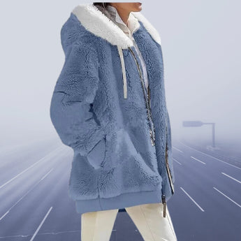 
A women's light blue teddy jacket with sherpa lining, featuring a hood, long sleeves, and a cozy overcoat design suitable for winter wear. The jacket is available in size 5XL.