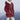 Women's burgundy teddy jacket with sherpa lining, featuring a hood and full sleeves.
