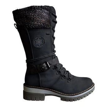 Black women's combat boots with chunky soles and quilted panels, featuring durable synthetic rubber material.