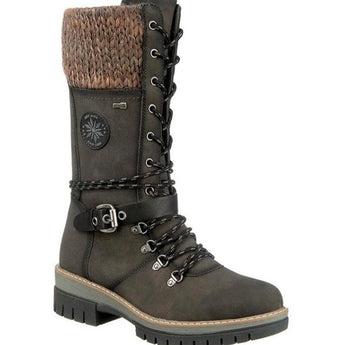 Green women's combat boots with a chunky sole and quilted panels.
