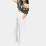 Burgundy women's high-waisted wide-leg palazzo pants in size XL, styled with a white top.