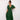 Burnt orange midi dress featuring a ruffle skirt and flutter sleeves, shown in grass green, size 2XL, worn by a model.