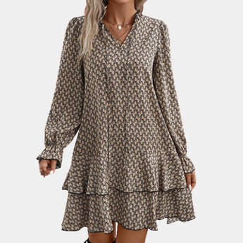 Women's khaki chain-link print long sleeve blouse in size 3XL, featuring a geometric shirt design with a classic collar and button-down front. The blouse has a stylish pattern that resembles tartan and is designed for a comfortable fit.