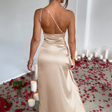 Champagne satin cowl neck silk evening gown, backless maxi dress with elegant draping, featuring a flowing design, ideal for weddings and formal events.