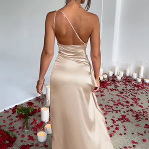 Champagne satin cowl neck silk evening gown, backless maxi dress with elegant draping, featuring a flowing design, ideal for weddings and formal events.