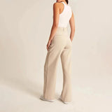 Charcoal gray high waist wide-leg trousers for women, showcasing the elegant drape and fit around the waist and thighs.