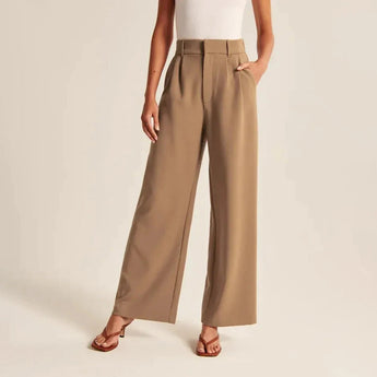 Charcoal gray high waist wide-leg trousers for women, showcasing a stylish design with a focus on the waist and loose-fitting wide legs.