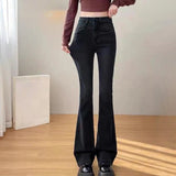 Chic Black Velvet Flare Jeans in high waist design, showcasing a winter fashion style. The jeans are in a size 2XL and made from a soft black velvet fabric, featuring flared legs and a fitted waist. The image highlights the texture and fit of the jeans, suitable for stylish winter wear.