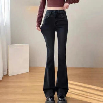 Chic Black Velvet Flare Jeans in high waist design, showcasing a winter fashion style. The jeans are in a size 2XL and made from a soft black velvet fabric, featuring flared legs and a fitted waist. The image highlights the texture and fit of the jeans, suitable for stylish winter wear.