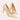 A pair of chic beige women's pointed toe flats displayed on a wooden surface, showcasing their elegant design and court shoe style.