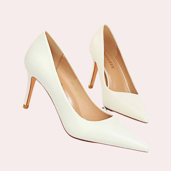 Bright yellow women's pointed toe flats with a chic design, showcased in size 42, resembling a basic pump style.