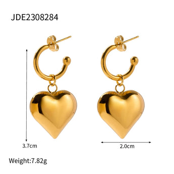 Chic two-tone heart hoop earrings in silver and gold, perfect romantic Valentine's jewelry.