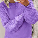 Chunky knit balloon sleeve sweater in purple, featuring an oversized fit with a 5XL size, worn by a woman. The sweater has textured knit detail and covers the arms and shoulders.