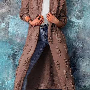 A chunky knit cardigan for women featuring bobble sleeves in a coffee color, size 3XL. The cardigan is designed with a relaxed fit, covering the shoulders, arms, and waist, and includes a collar for added style.