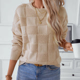 Chunky knit textured beige sweater for women, featuring long sleeves and a high neckline, ideal for autumn fashion.