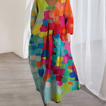 Colorful Bohemian Maxi Dress with an abstract print, featuring a V-neck and short sleeves.