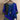 Colorful Bohemian Patchwork Blouse featuring an ethnic print in shades of blue and purple, designed as a plus-size top in 4XL. The blouse has a distinct neckline, long sleeves, and a relaxed fit, creating an eclectic and vibrant appearance.