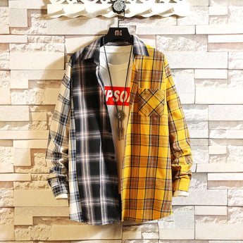 
Men's colorful plaid shirt in black and yellow with a Beauvais checkered pattern, displayed on a clothes hanger, featuring long sleeves and a classic collar.