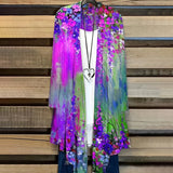 Colorful rainbow floral kimono cardigan in shades of purple and violet, displayed as a bohemian summer cover-up, featuring a flowing sleeve design.