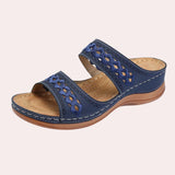 Colorful women's bohemian beaded slip-on sandals in a striking marine blue color, featuring intricate beadwork and a flat sole, perfect for summer wear.