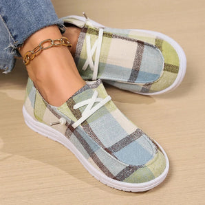 Colorful women's plaid slip-on sneakers in green, size 43, featuring a breathable and lightweight design with a stylish plaid pattern, suitable for outdoor activities and casual wear.