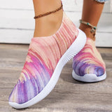 Colorful women's slip-on walking sneakers with a rainbow mesh design, featuring a lightweight build, predominantly in shades of purple, pink, and violet.