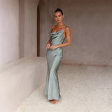 Copper satin one-shoulder evening gown with elegant draping, fitted waist, and floor-length design, showcasing a sophisticated and formal style suitable for an elegant event.