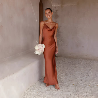 Elegant copper satin one-shoulder evening gown in a rose bronze hue, featuring a fitted waist and flowing skirt, suitable for formal events and evening wear, displayed in extra-large size.