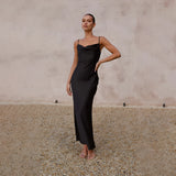 Copper satin one-shoulder evening gown showcasing elegant formal wear, highlighting the shoulder and waist with a flowing skirt.