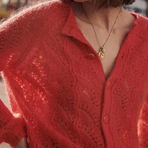 Coral Lace Cardigan with floral knit pattern, featuring magenta color, long sleeves, and a stylish collar, designed for women.
