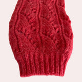 Coral lace cardigan made from lightweight floral knitwear for women, featuring a delicate pattern with woolen textures and a vibrant magenta color.